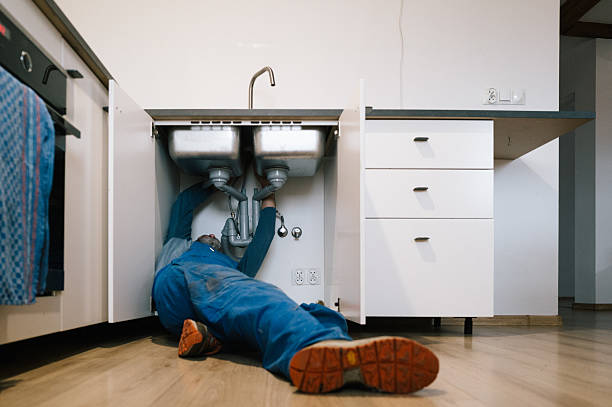 Professional Plumbing technician working in Roaring River, NC